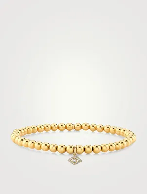Beaded Bracelet With 14K Gold Tiny Diamond Bezel Evil Eye Charm