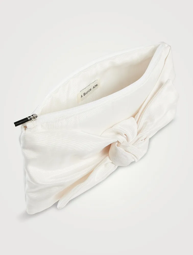 Bow Moiré Clutch