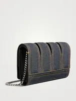 The Slash Four-Ring Denim Clutch