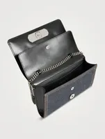 The Slash Four-Ring Denim Clutch