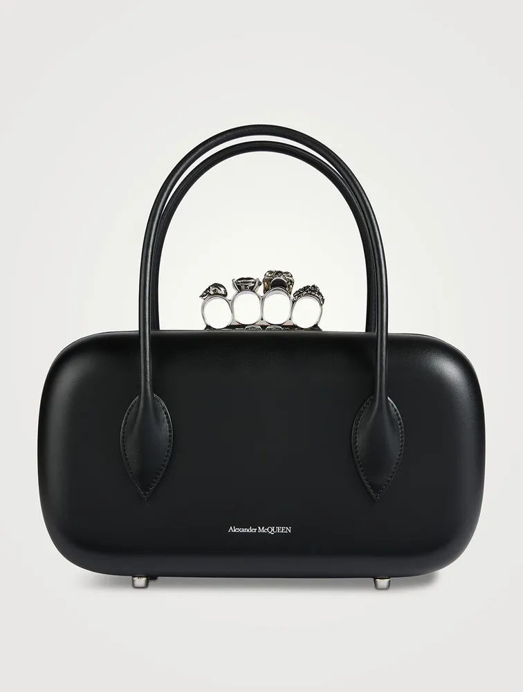 The Reverse Leather Clutch