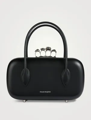 The Reverse Leather Clutch