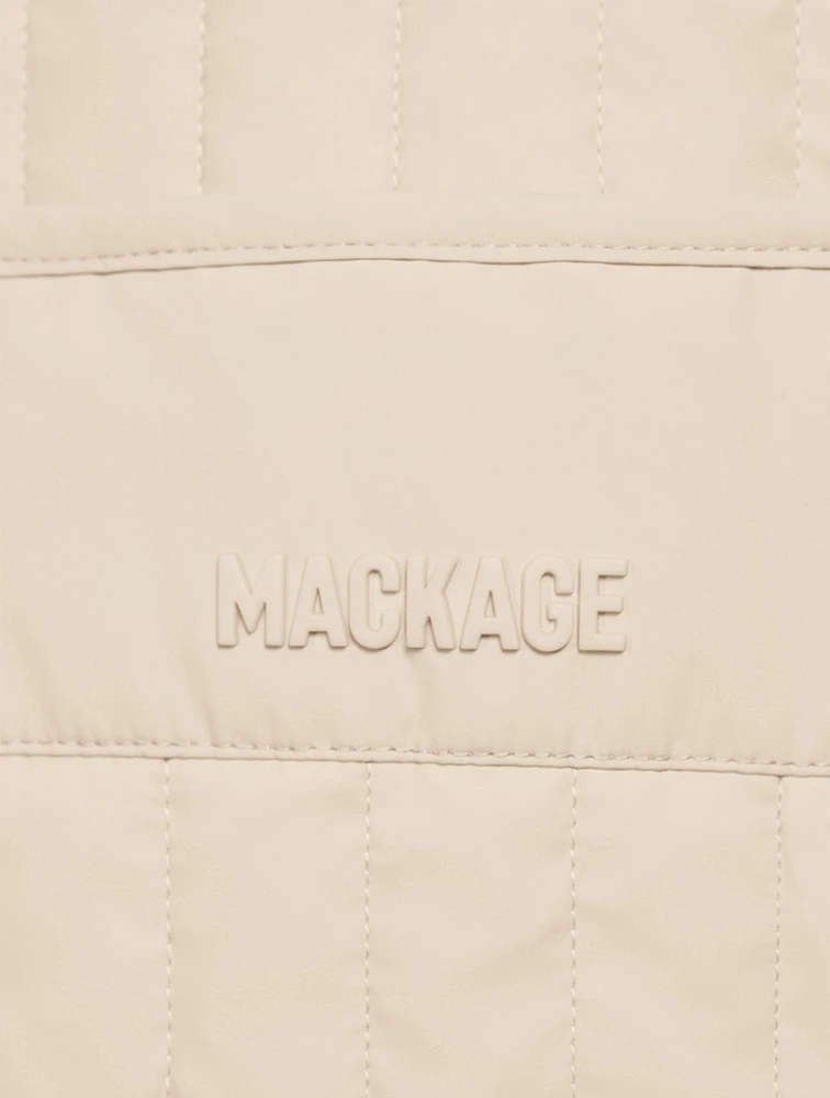Levi Light Down Vertical Quilted Vest