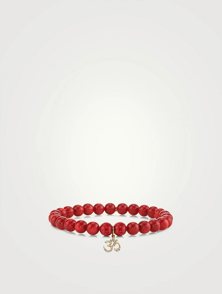 Red Coral Beaded Bracelet With Small Gold Diamond "Om" Charm