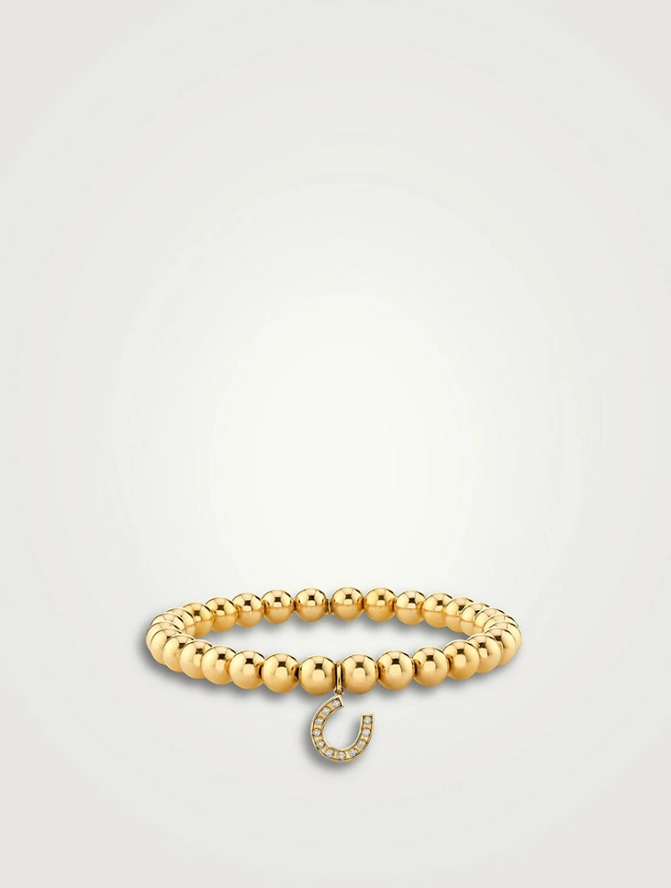 Gold Beaded Bracelet With Small Gold Bezel Diamond Horseshoe Charm