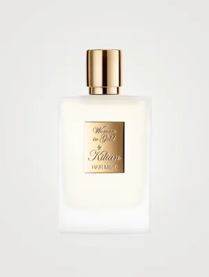 Woman in Gold Hair Mist