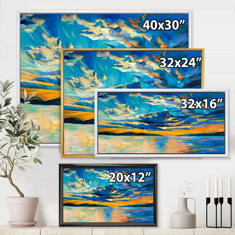 Designart Nuageux grand ouvert coucher de soleil sur l'horizon de l'océan ART MURAL À CADRE FLOTTÉ