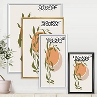Designart Soleil et lune orange abstraits avec des feuilles tropicales ART MURAL À CADRE FLOTT