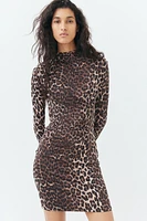 Robe moulante à effet drapé