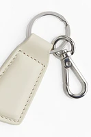 Porte-clés avec lanière en cuir