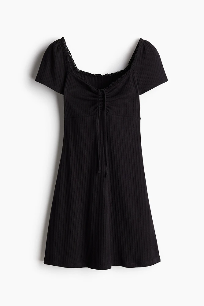 Lace-Trimmed Dress with Flared Skirt