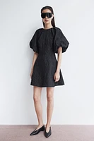 Robe en tissu jacquard avec dos à nouer