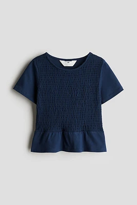 Smocked Peplum Top