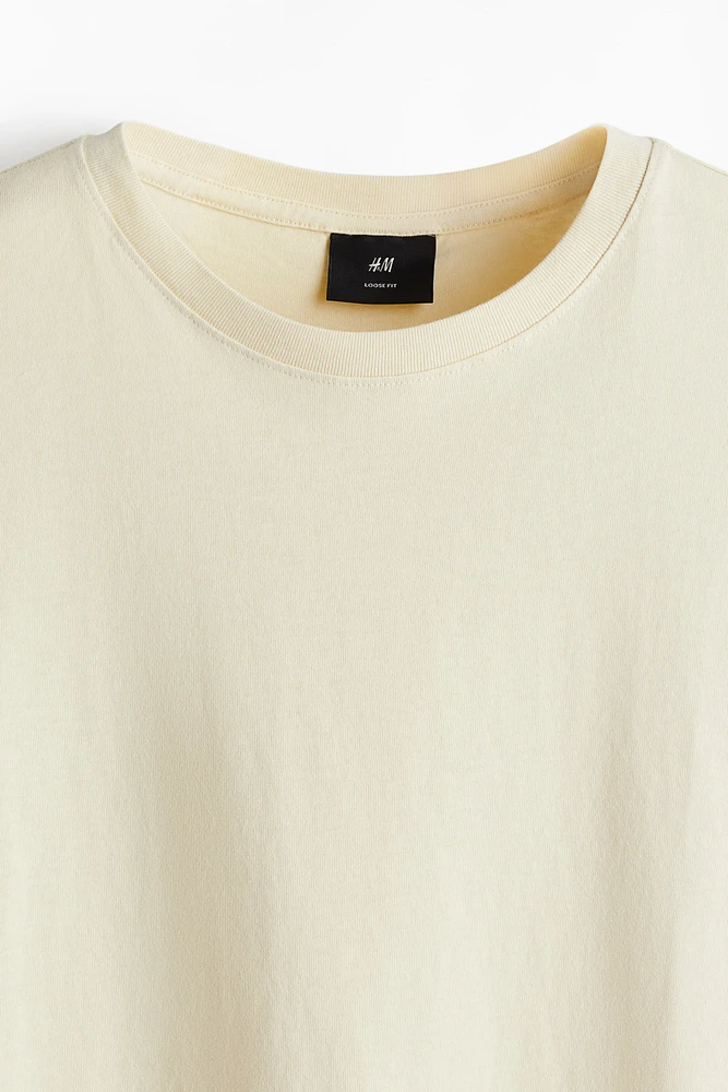 T-shirt flottant à l'aspect délavé