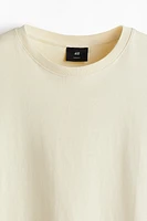 T-shirt flottant à l'aspect délavé