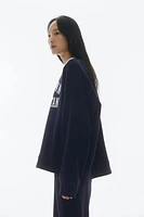 Sweatshirt with Text Motif