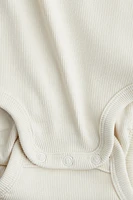 2-Pack Sleeveless Cotton Bodysuits
