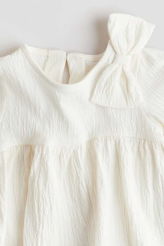 Blouse avec boucle
