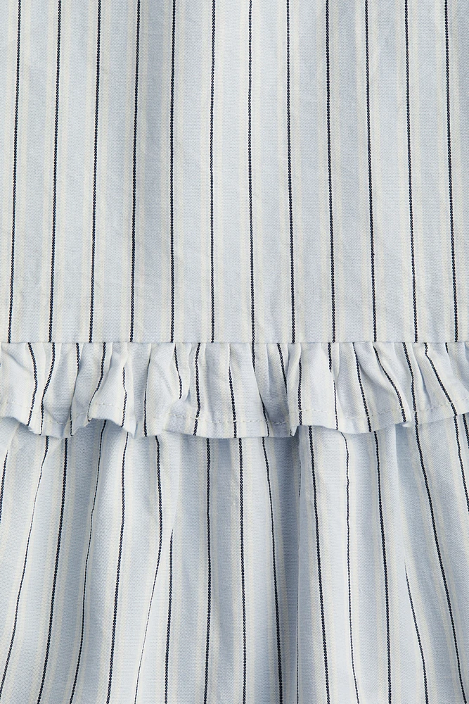 Haut péplum en coton