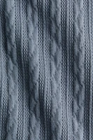 Kangourou façon tricot torsadé