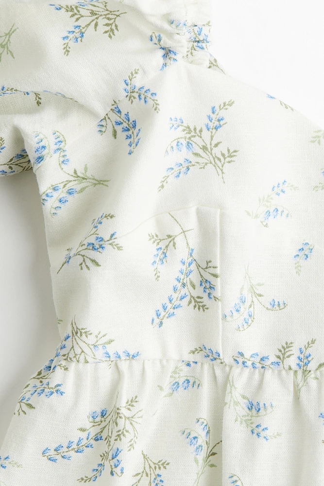 Robe à manches bouffantes