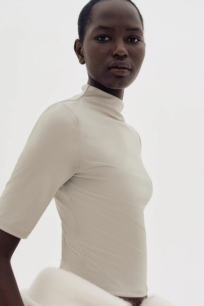 Haut en microfibre avec col cheminée