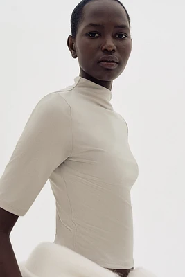 Haut en microfibre avec col cheminée