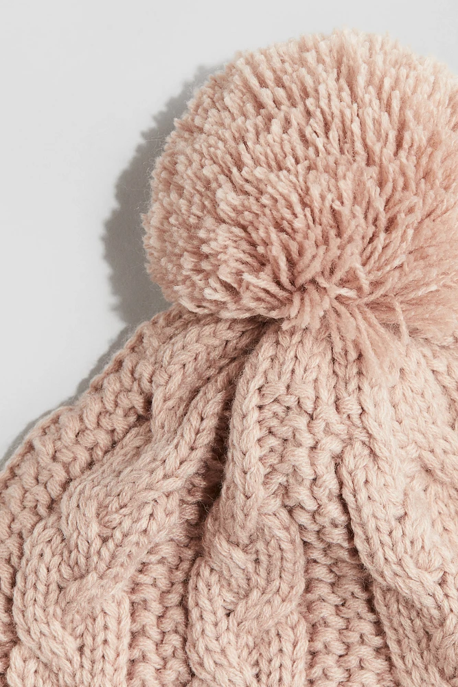 Tuque doublée en tricot torsadé