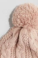 Tuque doublée en tricot torsadé
