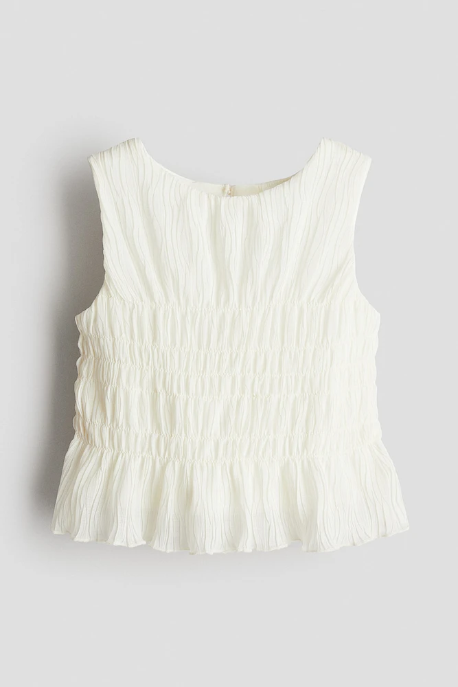 Smocked Peplum Top