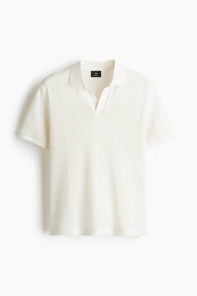 Polo classique en tricot ajouré