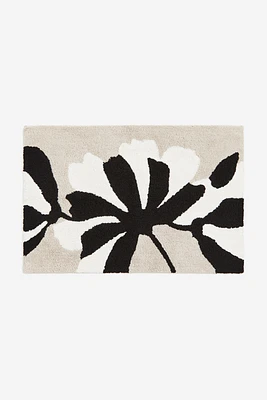 Tapis de bain fleuri