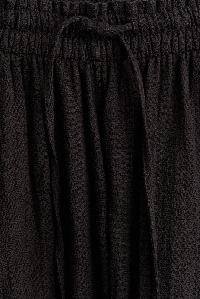 MAMA Pantalon large en mousseline