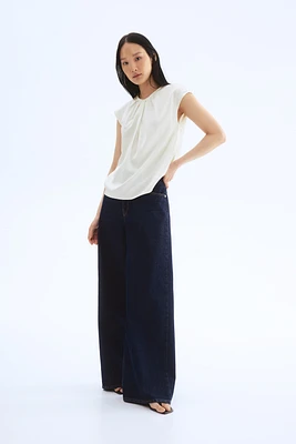 Blouse avec plis devant
