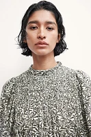 Robe avec détails en nid d'abeille