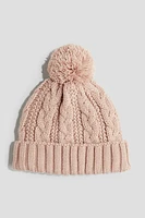 Tuque doublée en tricot torsadé