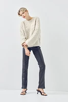 Chandail brodé en tricot torsadé