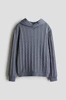 Kangourou façon tricot torsadé