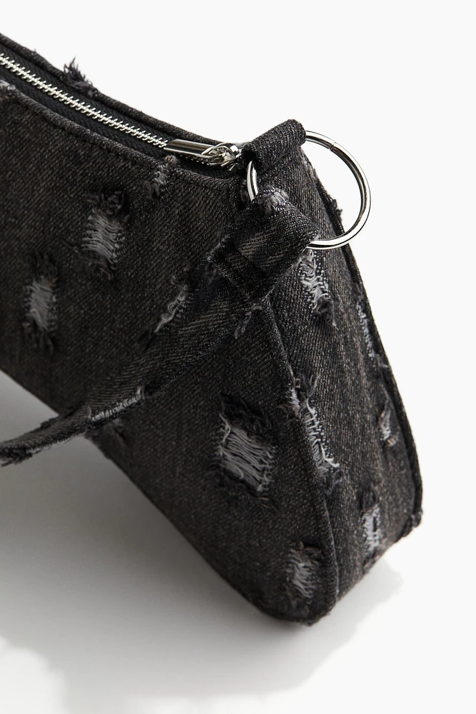 Sac bandoulière en denim à l'aspect usé