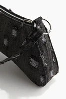 Sac bandoulière en denim à l'aspect usé