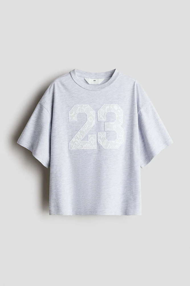 T-Shirt with Text Design
