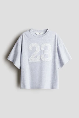 T-Shirt with Text Design