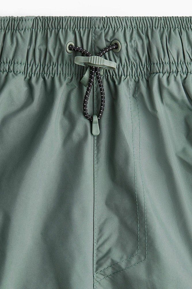 Long sports cargo shorts