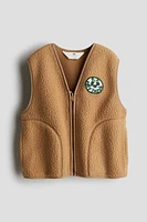 Veste sans manches en tissu peluche