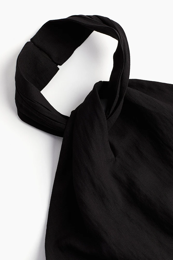 Combi-pantalon dos nu avec détail noué