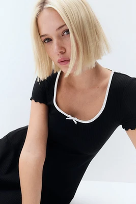 Overlocked-Trim Dress with Flared Skirt