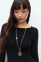 Collier avec pendentif et fermoir en T