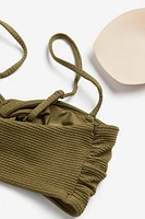 Haut de bikini rembourré avec détail torsadé