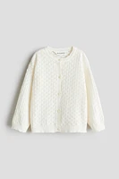 Chandail en tricot pointelle de coton
