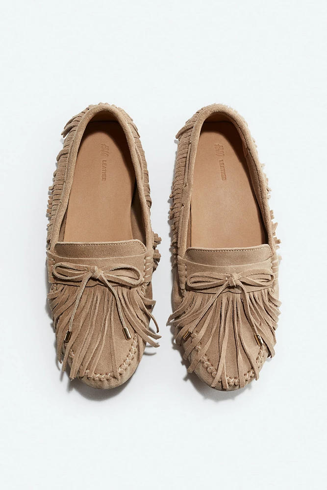 Mocassins frangés en cuir velours